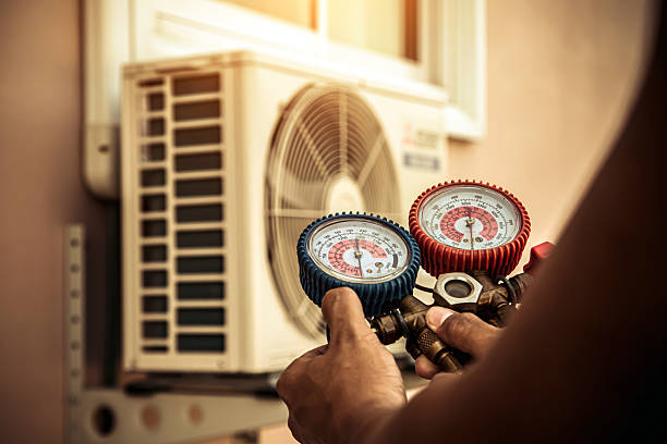 Professional Hvac technician working in George West, TX